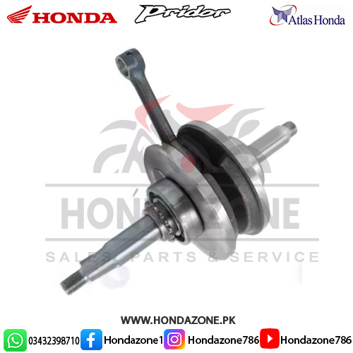 Close-up of a genuine crank shaft for Honda Pridor motorcycle engine.