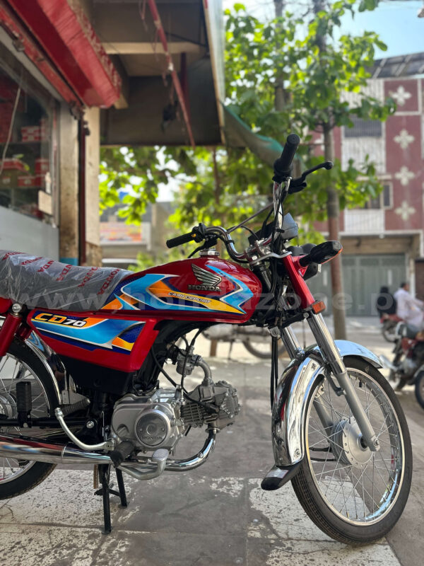 Honda CD70 2026 model red color side view