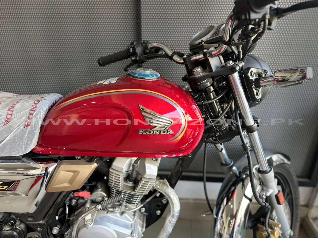 Honda CG150 2026 Red color model with sporty design parked outdoor in Pakistan
